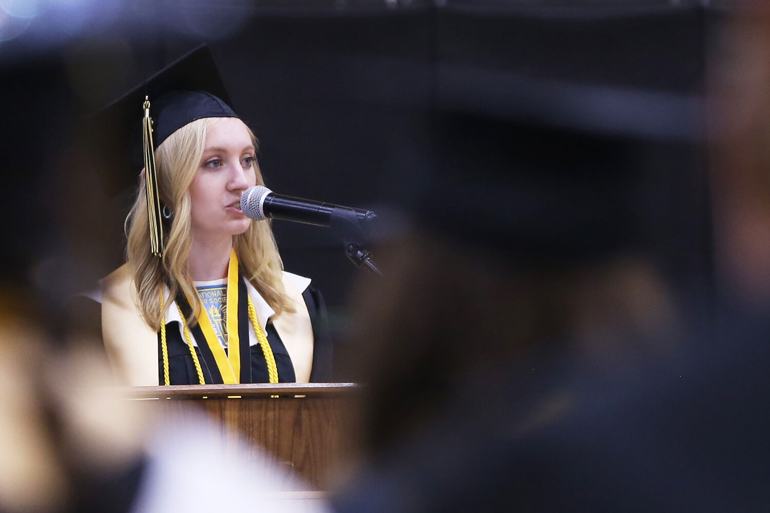 Sage Palser looks up to the audience as she shares a story of her friend